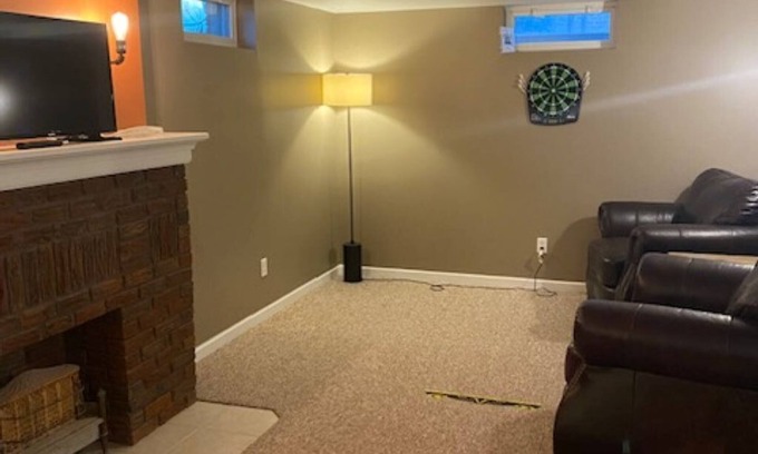 McPherson Casa | Charming Brick Bungalow with Basement Family Room!