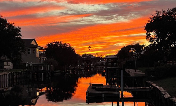 Butler Beach Casa | Charming Canal Front Cottage! Walk to the Beach!