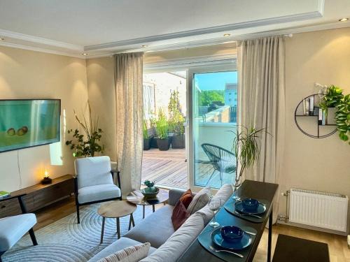 Skoyen Apartamento | Charming central penthouse with big terrace