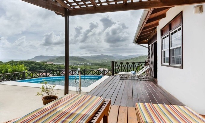 Cap Estate Cabaña | Charming Cottage Located In Cap Estate - Orchid Cottage 1 Bedroom Home by RedAwning