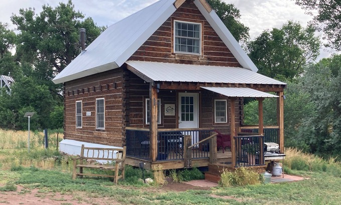 Canon City Cabina | Charming Creekside Cabin next to 4 Mile Creek with mountain views. Dog friendly!