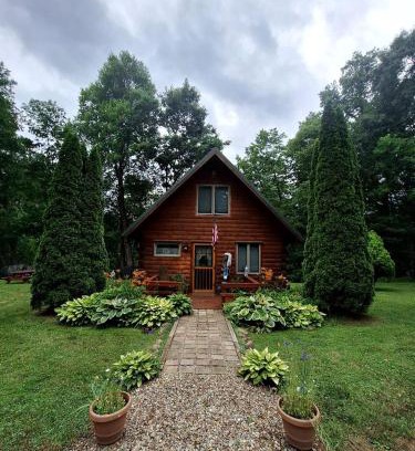 New Bedford Casa | Charming Creekside Log Cabin with Wood Burning Stove Overlooking the Neshannock Creek, Western PA