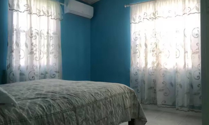 Ruby Casa | Charming house in terrific Long Bay with AC, WiFi