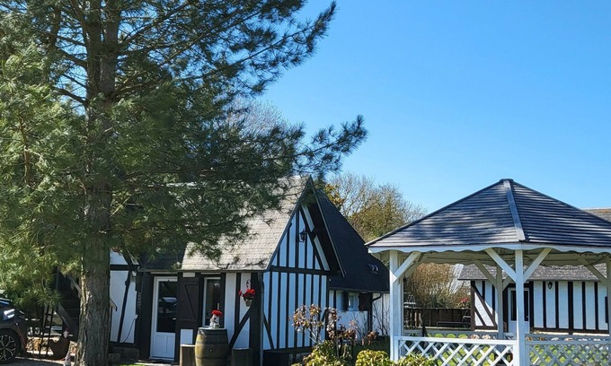 La Roussiere Cabina | Charming Normandy-style guest cottage, pets welcome, enclosed grounds