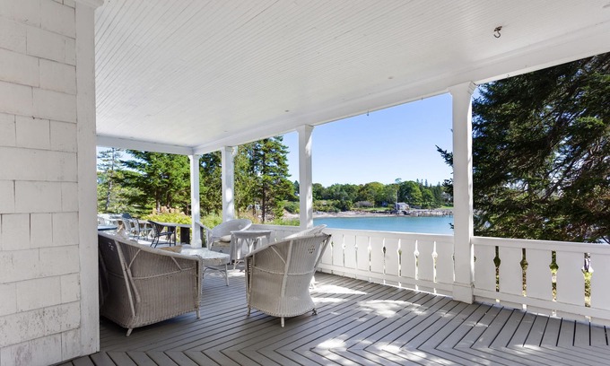 Northeast Harbor Casa | Charming summer cottage overlooking Gilpatrick Cove near Acadia National Park.