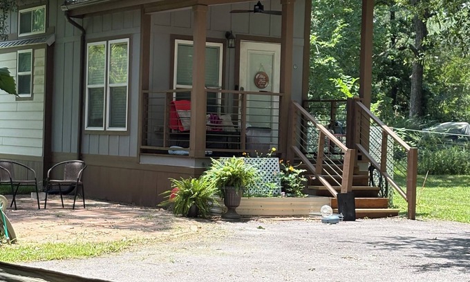 Conroe Cabaña | Charming Tiny Home in Conroe with huge patio +grill & lots of green space.