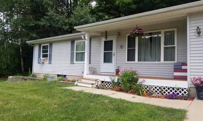 Rapid City Casa | Charming Torch Lake 3-bedroom 1 bath Cabin