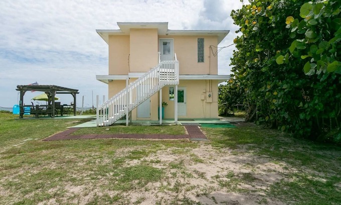 Melbourne Beach Casa | Charming Two Story House located directly on Melbourne Beach.