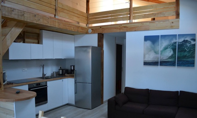 Tosse Casa | Encantador dúplex bien equipado con terraza de madera