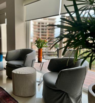 Zona hotelera del norte Apartamento | Chic 1BR 1BA Zoho Skies condo with rooftop pool stunning views