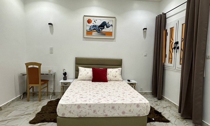 Point E Apartamento | Chic apartment with a cute little garden. 30 minutes from the AIBD airport