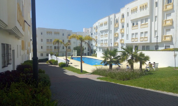 La Nouvelle Ville Ibn Batouta Apartamento | Apartamento elegante con piscina