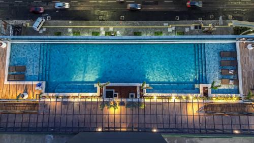 Armacao Apartamento | Chic Beachfront Oasis with Stunning Ocean Views