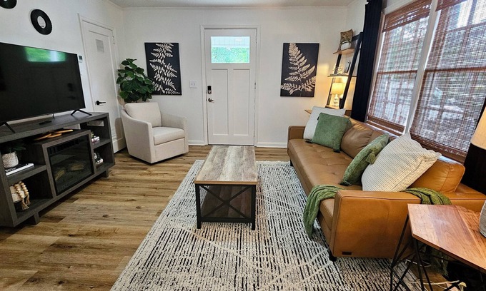 Valdosta Cabaña | Chic Central Cottage- Wood Floors, Fireplace, Game Room & Firepit- Pet Friendly