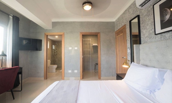 Downtown Santo Domingo Apartamento | Apartamento elegante en el centro de la ciudad con piscina en la azotea + gimnasio