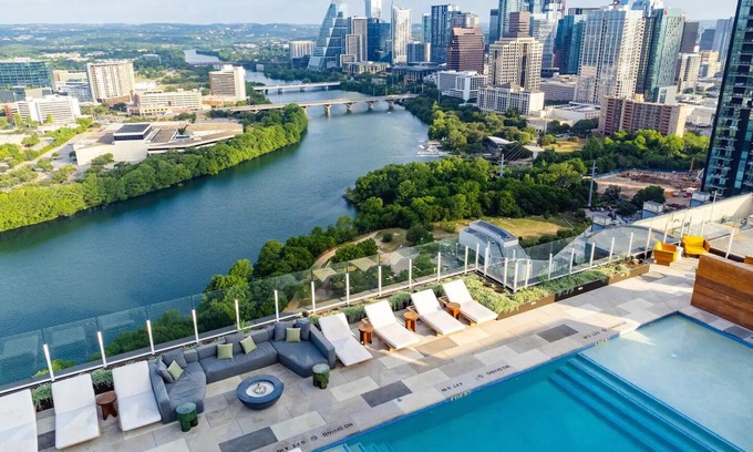 Rainey Street Historic District Hotel | Chic tower condo with city views in downtown Austin Texas. Pets Welcome