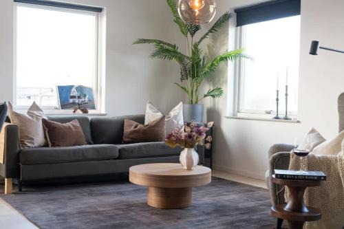 Bastad Casa | Chocolaty Warmth Home 3BR Flat with Cozy Balcony