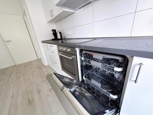 Frohnhausen Apartamento | City Apartment with WIFI, Kitchen and 4K TV
