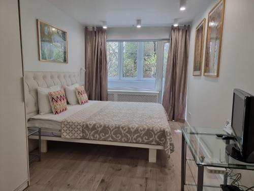 Grizinkalns Apartamento | City Inn Riga Apartment, new renovated in Quiet center with balcony with parking
