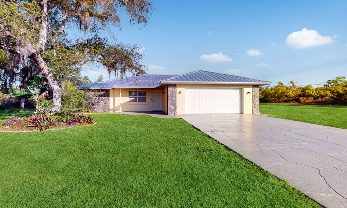 Lake Placid Casa | Classic home close to Lake Placid with modern updates, W/D, AC, & patio