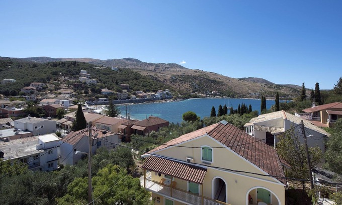 Kassiopi Apartamento | Close to the beach, spacious one-bedroom apartment with sea views.