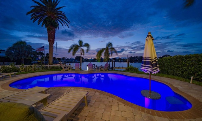 Indian Rocks Beach Casa | Coastal Elegance: Retreat with Heated Pool, Golf Cart, and Entertainment Haven