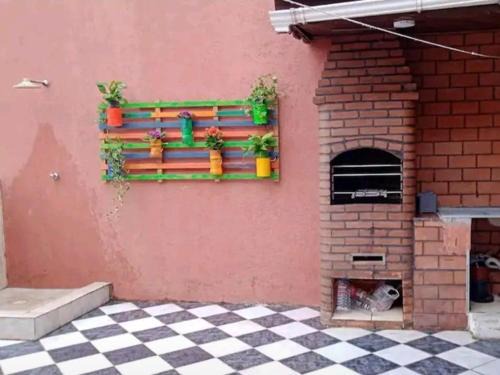 Vila Julia Apartamento | Cobertura com Churrasqueira própria e Wi-Fi perto da Praia - Excelente para Família e Amigos