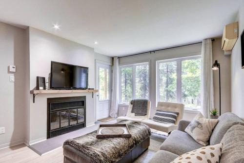 Mont-Tremblant Apartamento | Cocon ensoleillé au coeur de Mont-tremblant