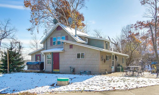 Campbellsport Cabaña | Colorful Cottage w/ Hot Tub - Steps to Long Lake!