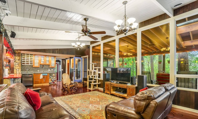 Shoreline Casa | Colorful dog-friendly getaway with covered deck, firepit, fast WiFi, & grill