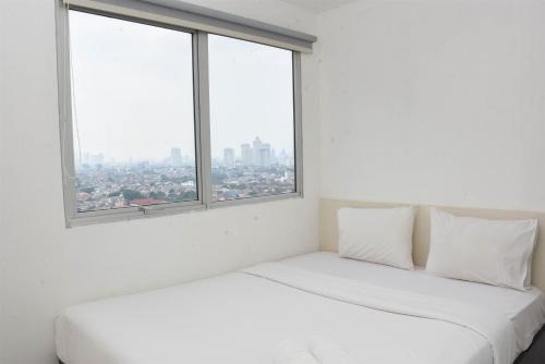 Cipulir Apartamento | Comfort and Simply 2BR at Pakubuwono Terrace Apartment By Travelio