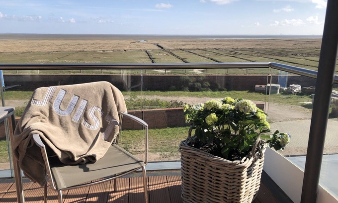 Juist Apartamento | Comfort vacation apartment with south-facing balcony and unique view of the mudflats