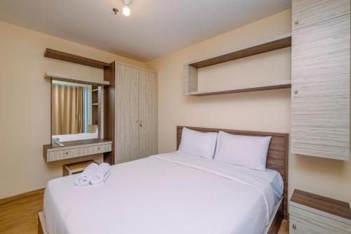 Kayu Putih Apartamento | Comfortable and Warm 2BR at Tifolia Apartment By Travelio