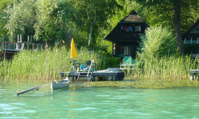 Krumpendorf am Woerther See Casa | Pintoresca casa de madera a orillas del lago Wörthersee para 6 personas