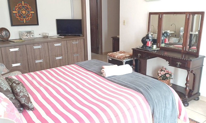 Cambui Casa | Habitación cómoda, baño privado, wifi, garaje.