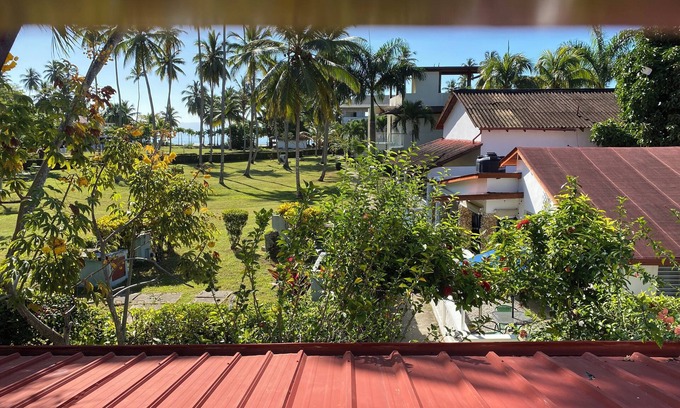 Puerto Bahia Villa | Confortable casa adosada con jardín y porche, en preciosa urbanización de playa.