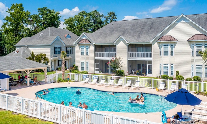 Little River Casa | Comfortable townhome with loft, shared pool, WiFi, AC, & W/D - near beach & golf