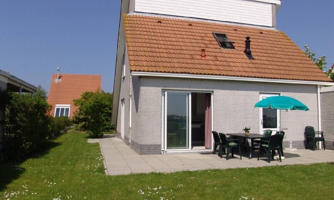 Scharendijke Casa | Cómoda casa de vacaciones con sala de estar adicional y sauna junto al mar.