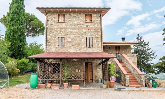 Montone Apartamento | Cómoda casa de vacaciones en Montone con jardín