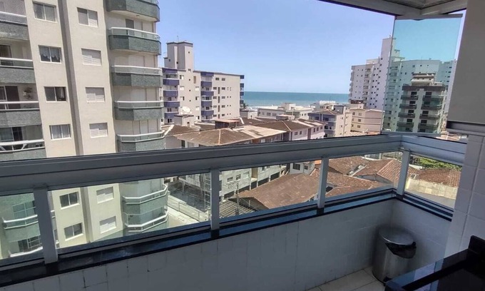 Praia Grande Apartamento | Complete apartment with sea view, 1 block from the beach and 1 parking space