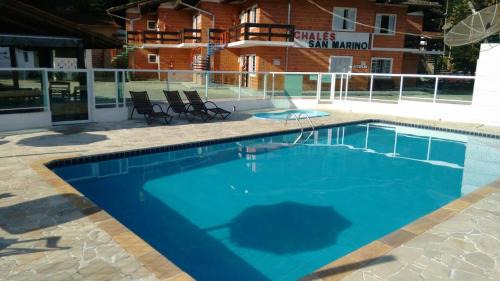 Praia da Enseada Apartamento | Cond Apartamentos Chalés San Marino