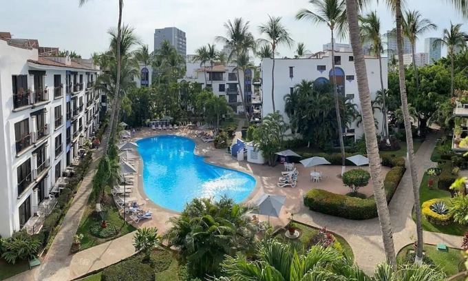 Zona hotelera Hotel | CONDO BELLA BY TRVL2HM
