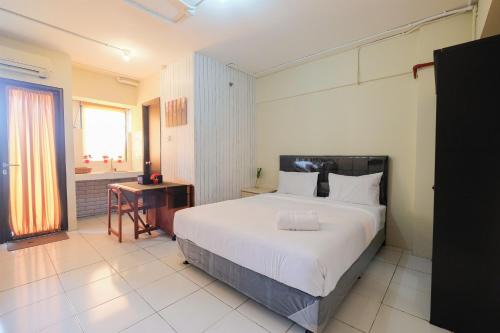 Kebagusan Apartamento | Contemporary Studio at Kebagusan City Apartment By Travelio