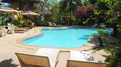 San Juan Complejo | Coral Cay Resort, Inc.