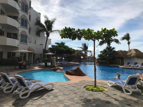 Cerritos Apartamento | Costa Bonita Condominiums & Beach Resort - Primer planta