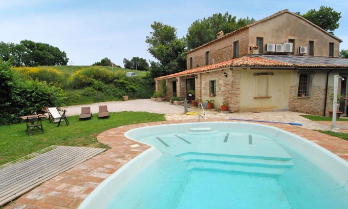 Granarola Apartamento | Apartamento con A/C, WIFI, piscina, TV, patio, mascotas permitida, vista panorámica, aparcamiento