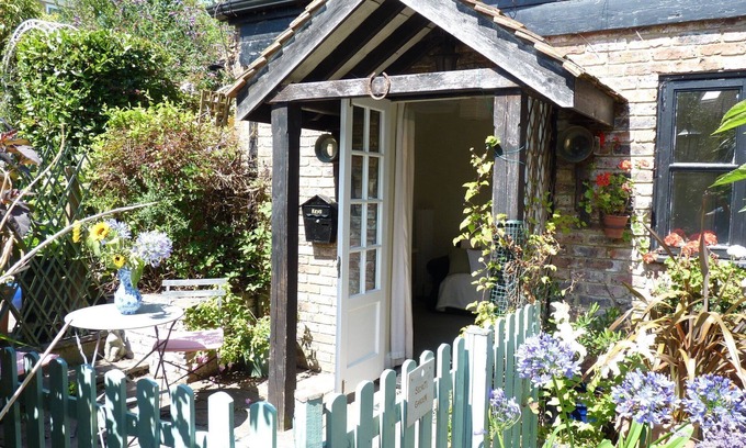 Eastbourne Cabaña | Secret Garden - Acogedor refugio de cabañas para parejas