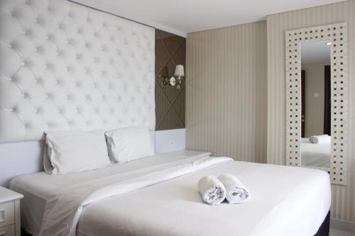 Braga Apartamento | Cozy 2BR Apartment at Tamansari Tera Residence near BIP By Travelio