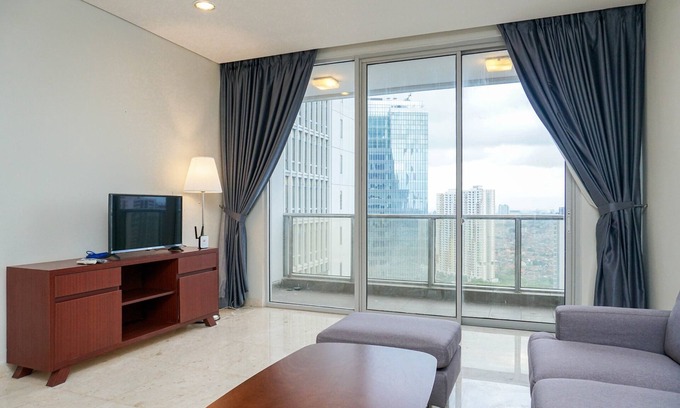 Karet Apartamento | Cozy 2BR at Empyreal Epicentrum Apartment By Travelio