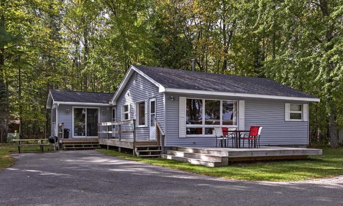 Burt Lake Casa | Cozy Alanson Cottage - Steps to Dock on Burt Lake!
